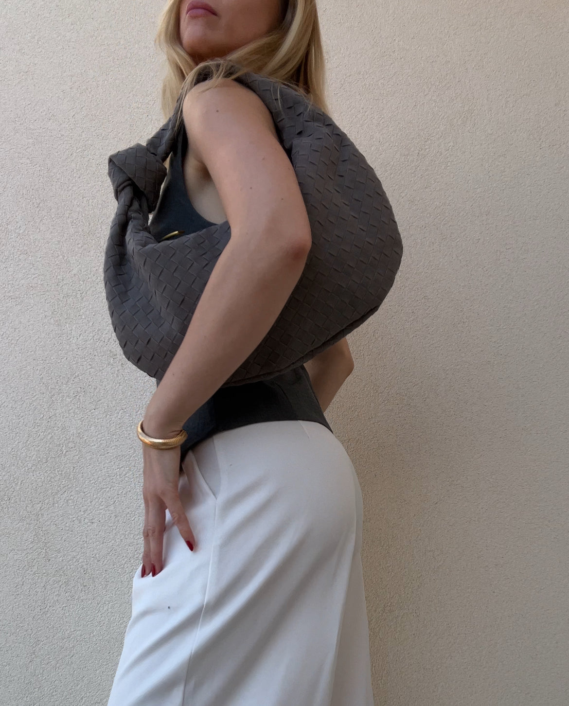 Timeless grey shoulder handbag made from premium vegan suede that complements every wardrobe.