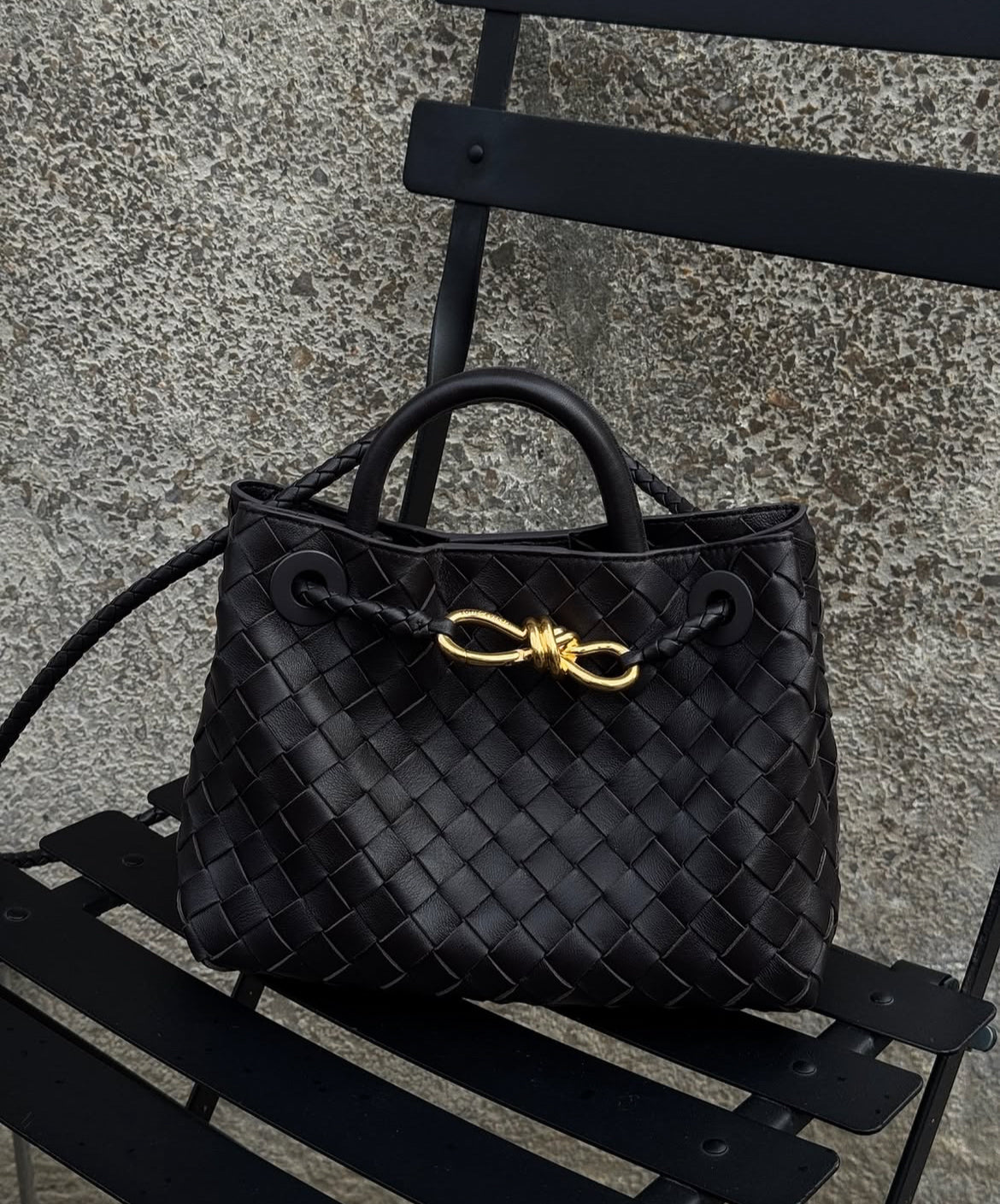 Black woven shoulder handbag minimalist styling