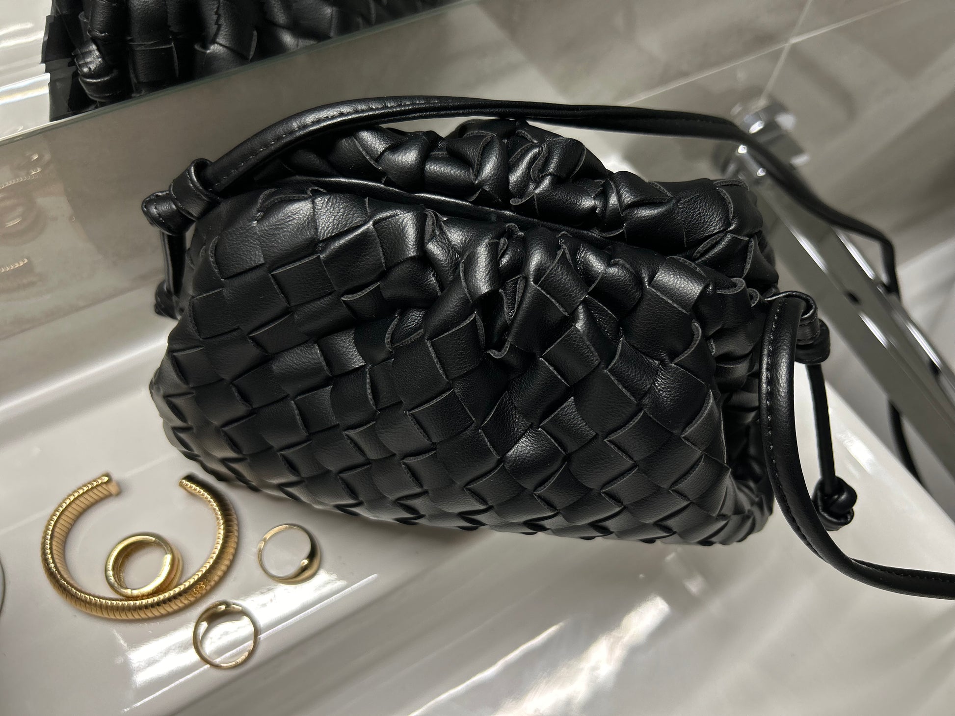 This trendy black woven bag is perfect for a night out or summer holiday! Made from luxurious vegan leather, this hobo clutch features a stylish zipper closure. Makes a wonderful birthday gift for a fashion-forward friend.gift for wife pattybofficial