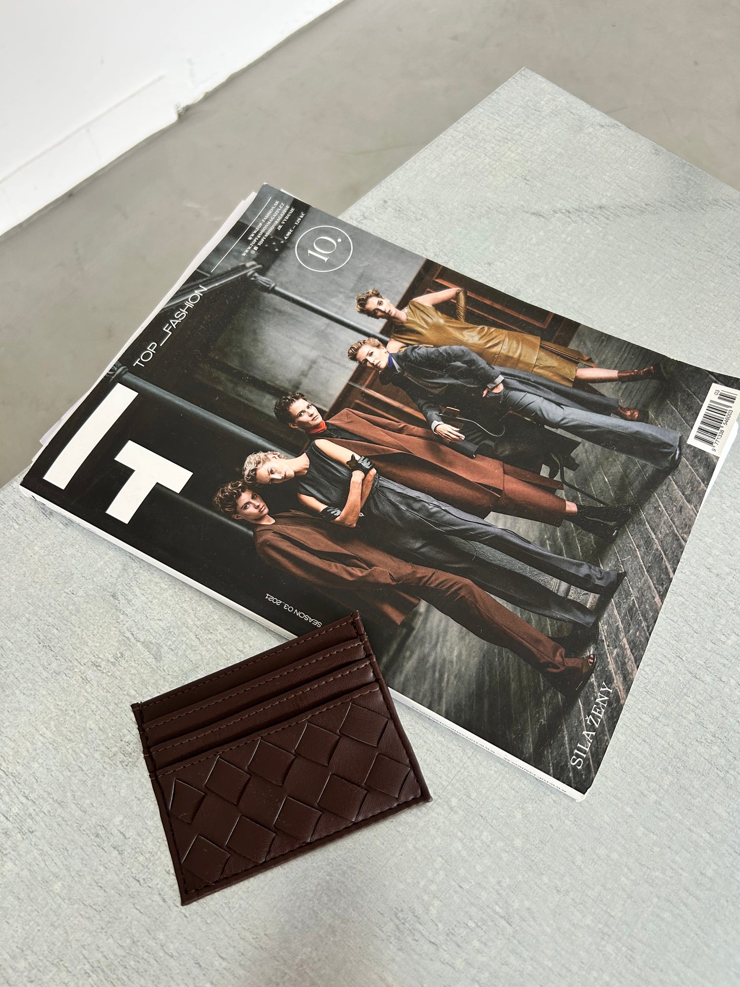 Dark brown vegan leather cardholder with minimalist design