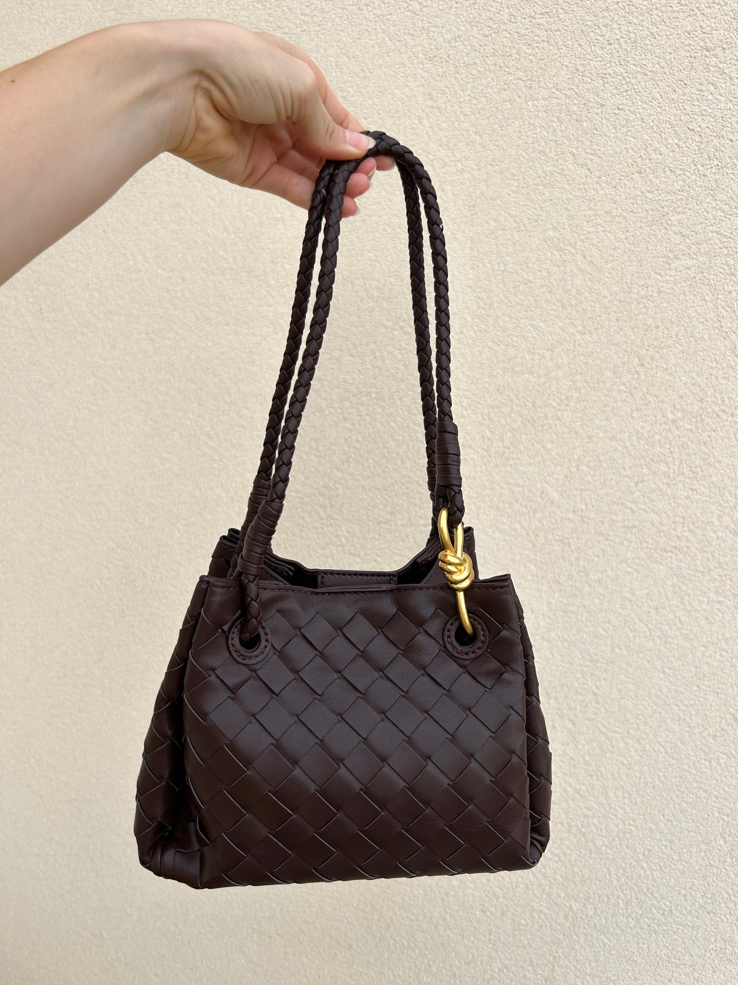 Dark brown woven vegan leather shoulder handbag with braided straps