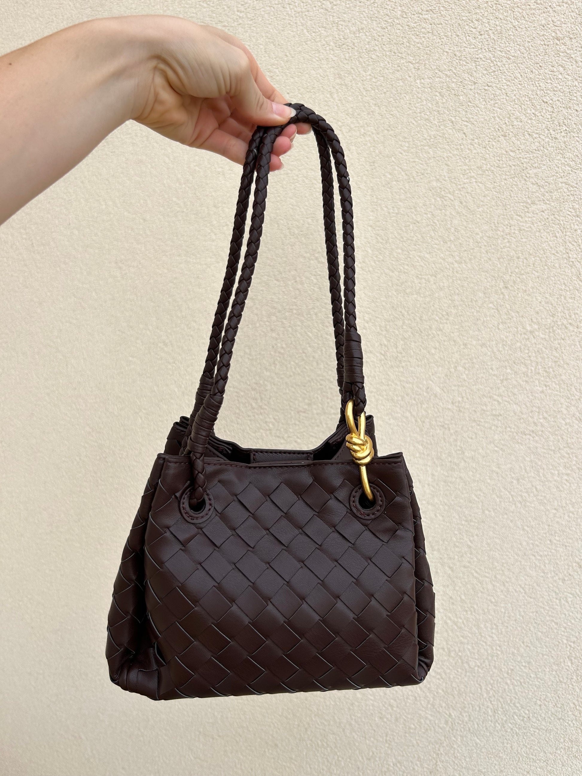 Dark brown woven vegan leather shoulder handbag with braided straps