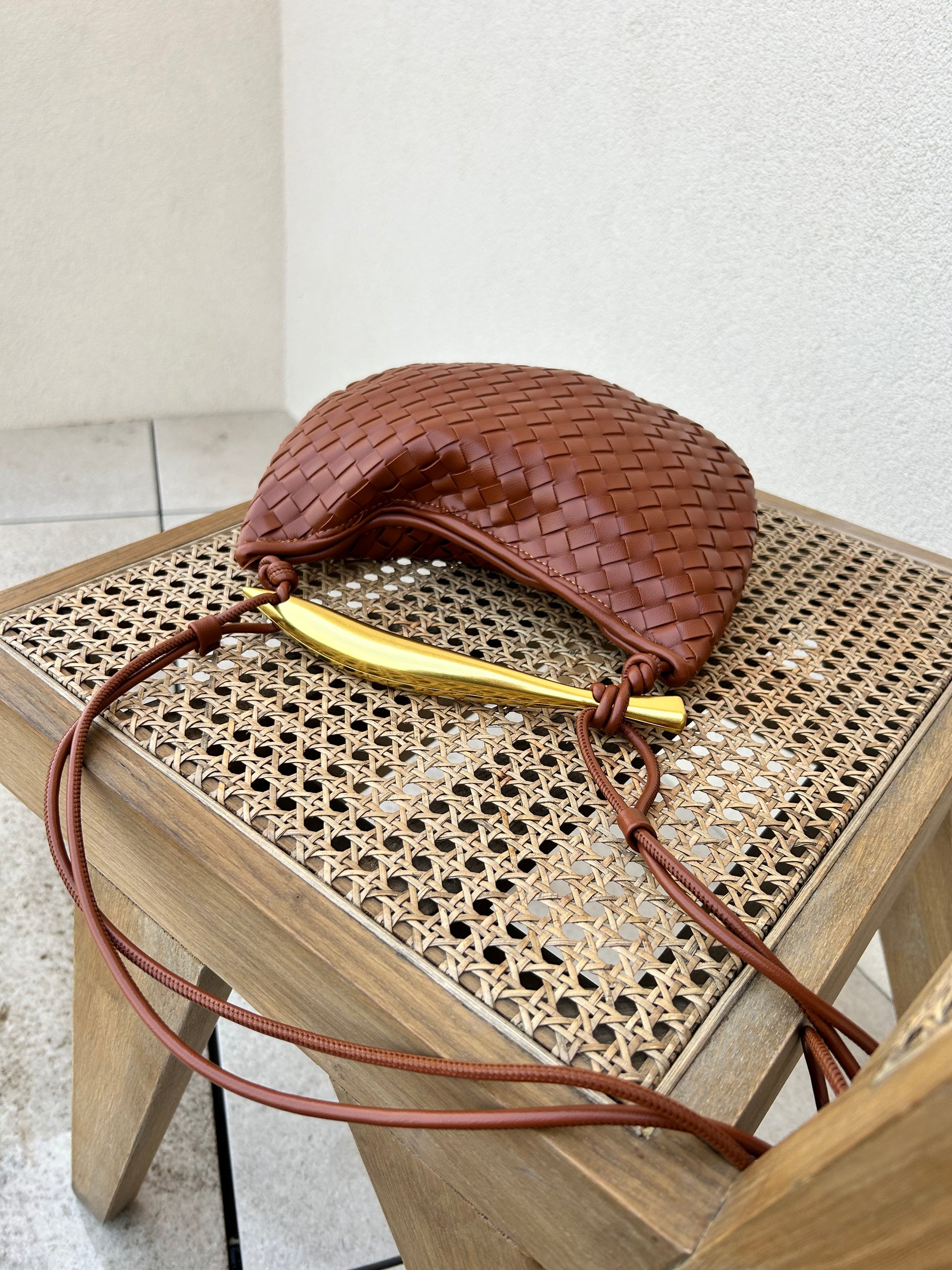 Elegant brown vegan leather crossbody handbag perfect for everyday wear, travel and city styling.