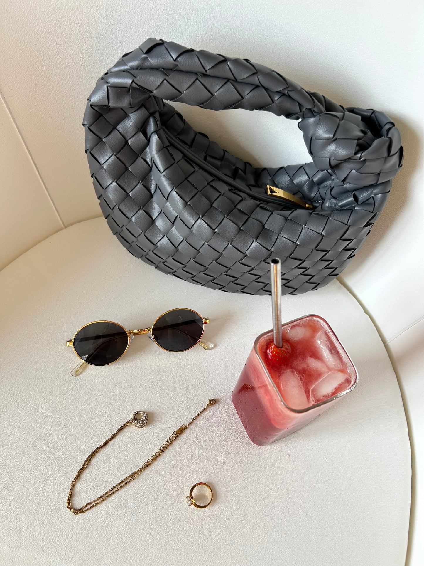 Elegant grey clutch styled for evening event