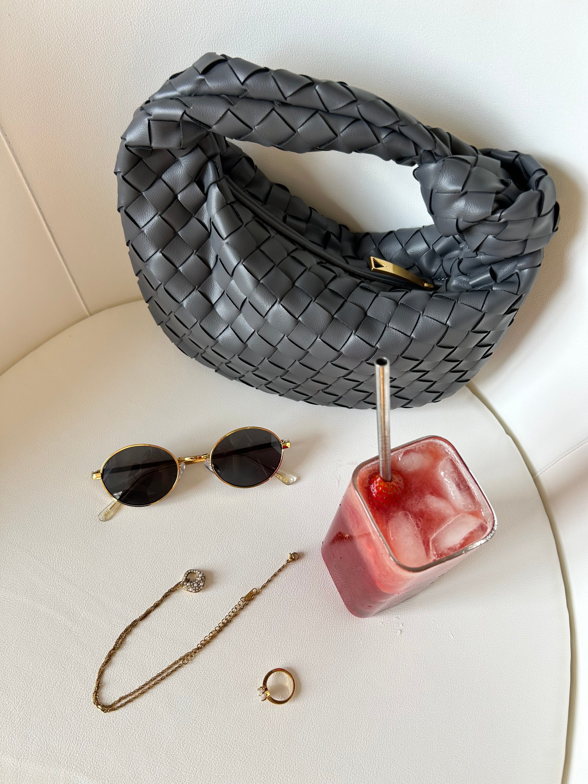 Elegant grey clutch styled for evening event
