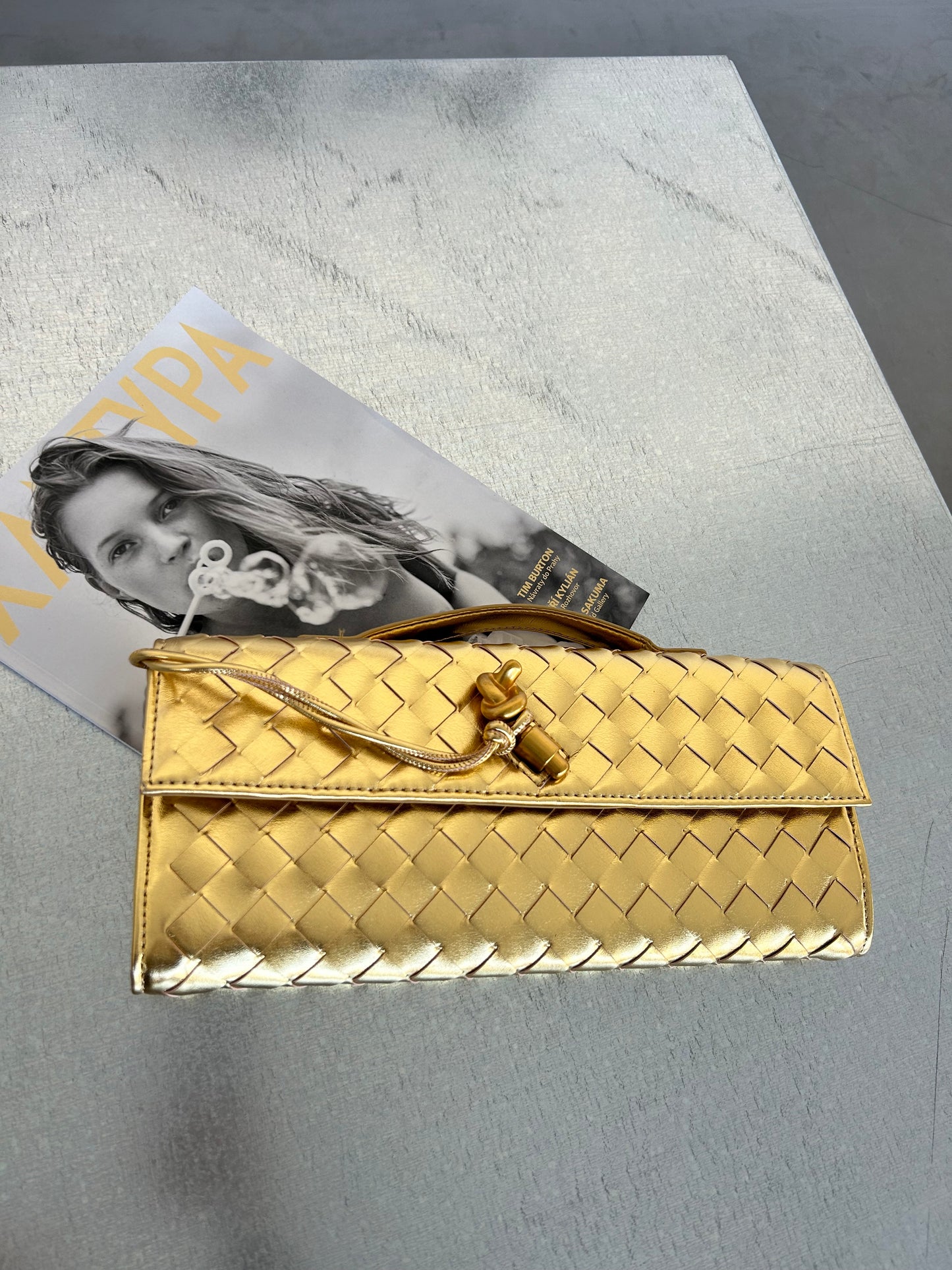 GIFT WRAPPING AVAILABLE - simply mark your order as a "gift"

Dimensions: length 31 x height 15 x width 4 cm , adjustable strap of total length 120 cm 

Elevate your style with our Braided Top Handle Crossbody Clutch, featuring a sleek woven design and a luxe gold pin accent. This chic handbag for women is the perfect blend of elegance and practicality, offering both a sophisticated top handle and an adjustable strap for versatile wear. Whether you're attending a special event or running errands, this best 