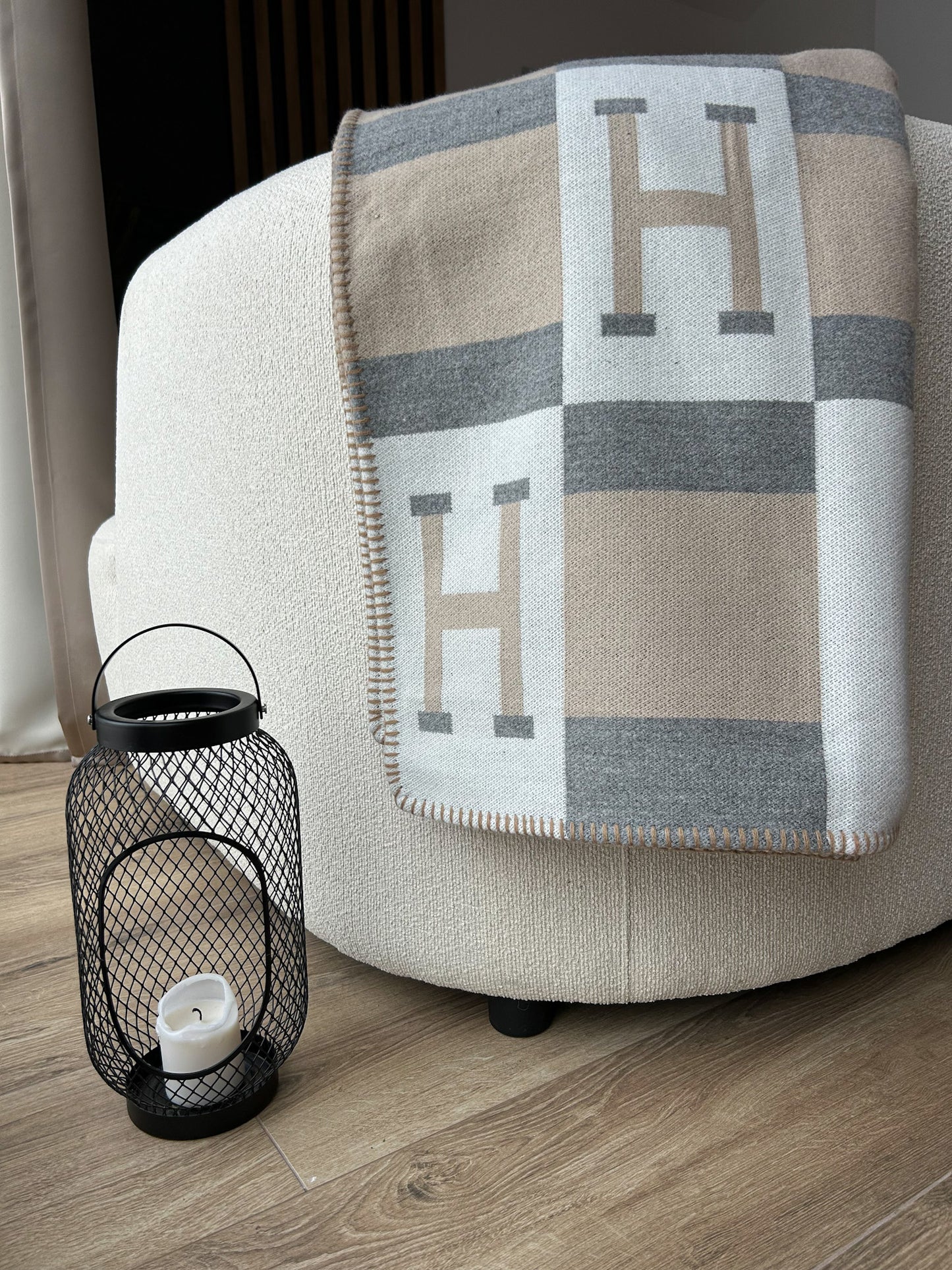Luxury Scandinavian throw blanket in neutral tones for modern interiors. Minimalist design, elegant texture, and a perfect accent for creating a cozy, stylish, and harmonious home.