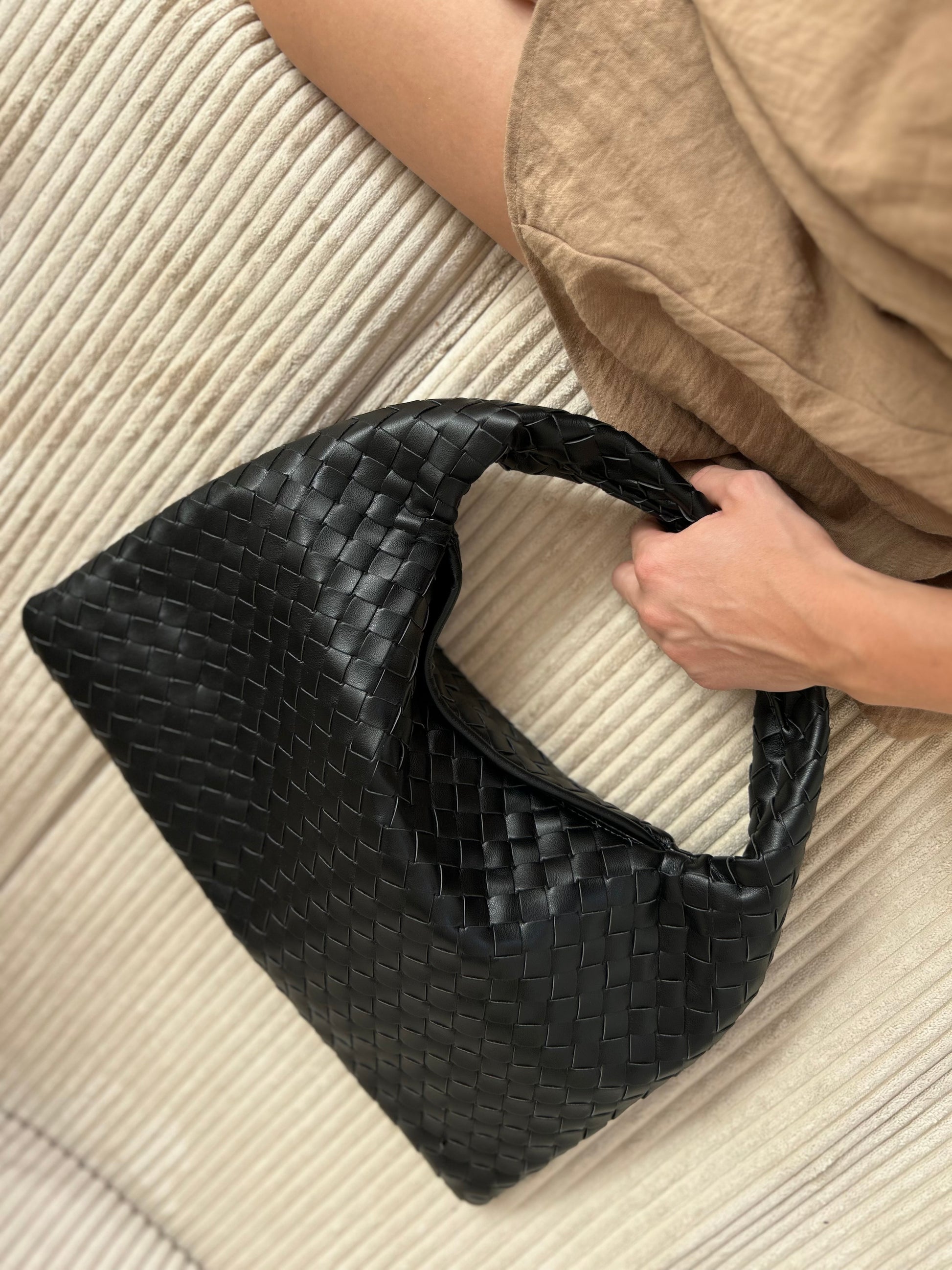 Minimalist everyday black tote bag styled with casual city outfit