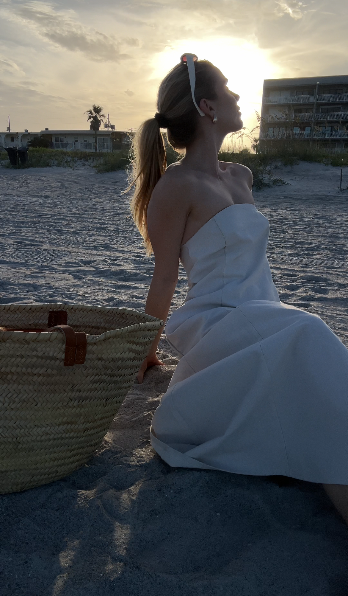 Minimalist linen summer dress for women featuring a timeless strapless silhouette.