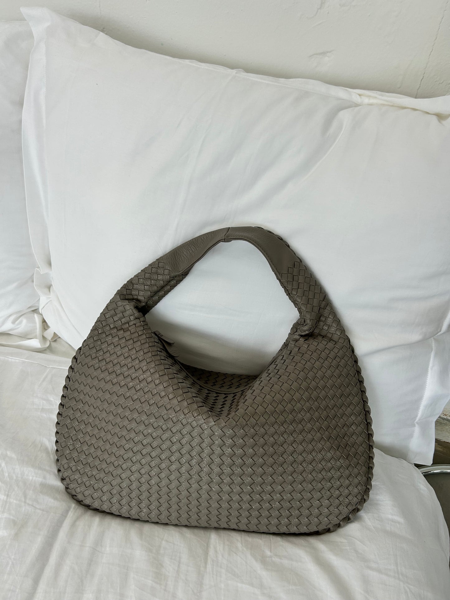 Slouchy everyday shoulder bag soft structure close-up