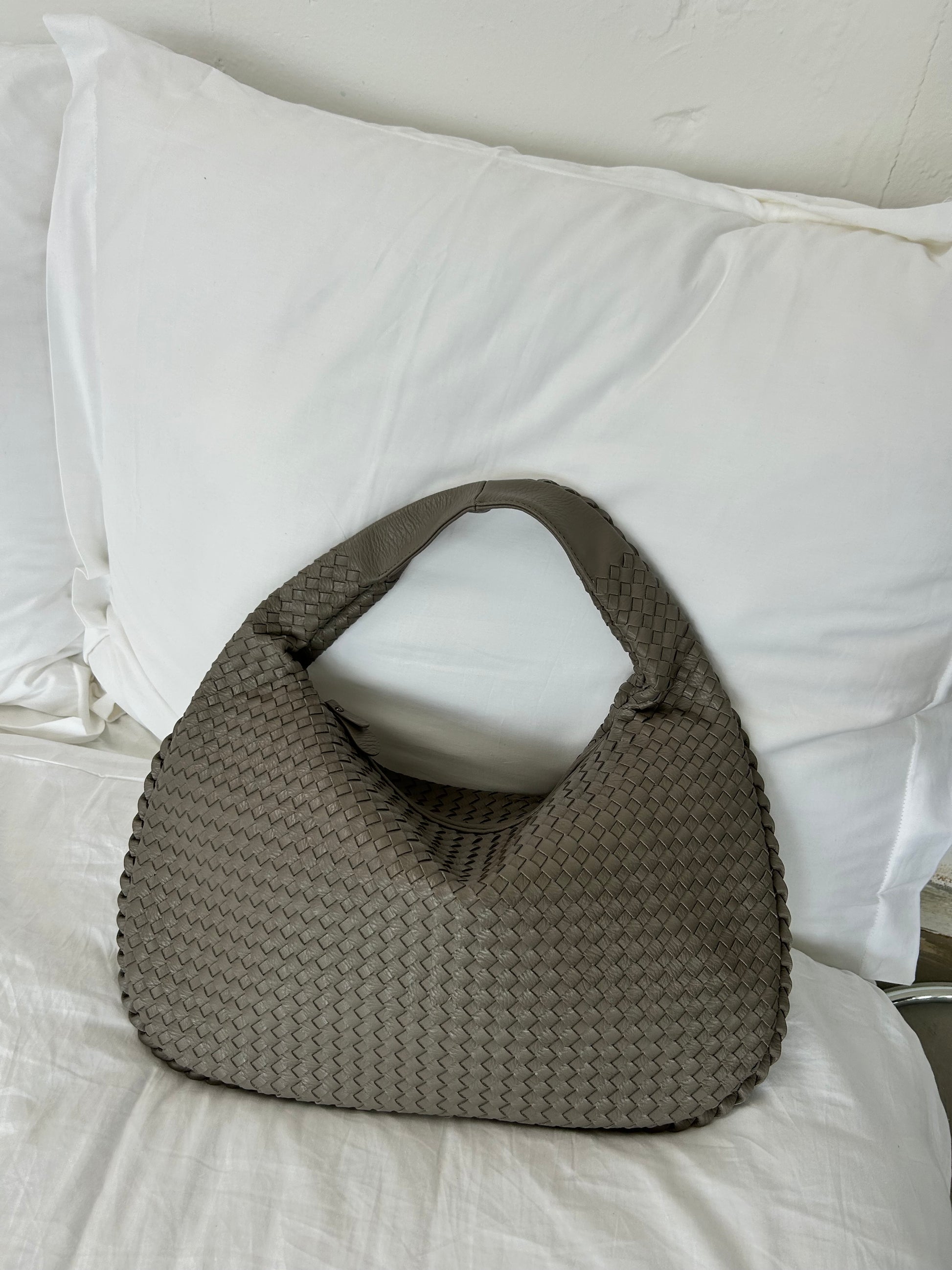 Slouchy everyday shoulder bag soft structure close-up