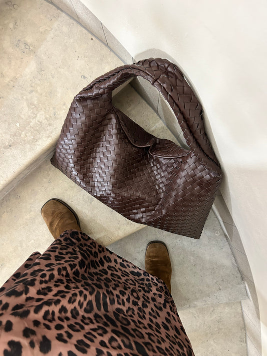 luxury hobo shoulder bag in dark brown colour, made from vegan leather by hand woven technique, trendy extra large weekender bag idea for travelling or as a work bag as this woven handbag easily fits laptop and all essentials for everyday life