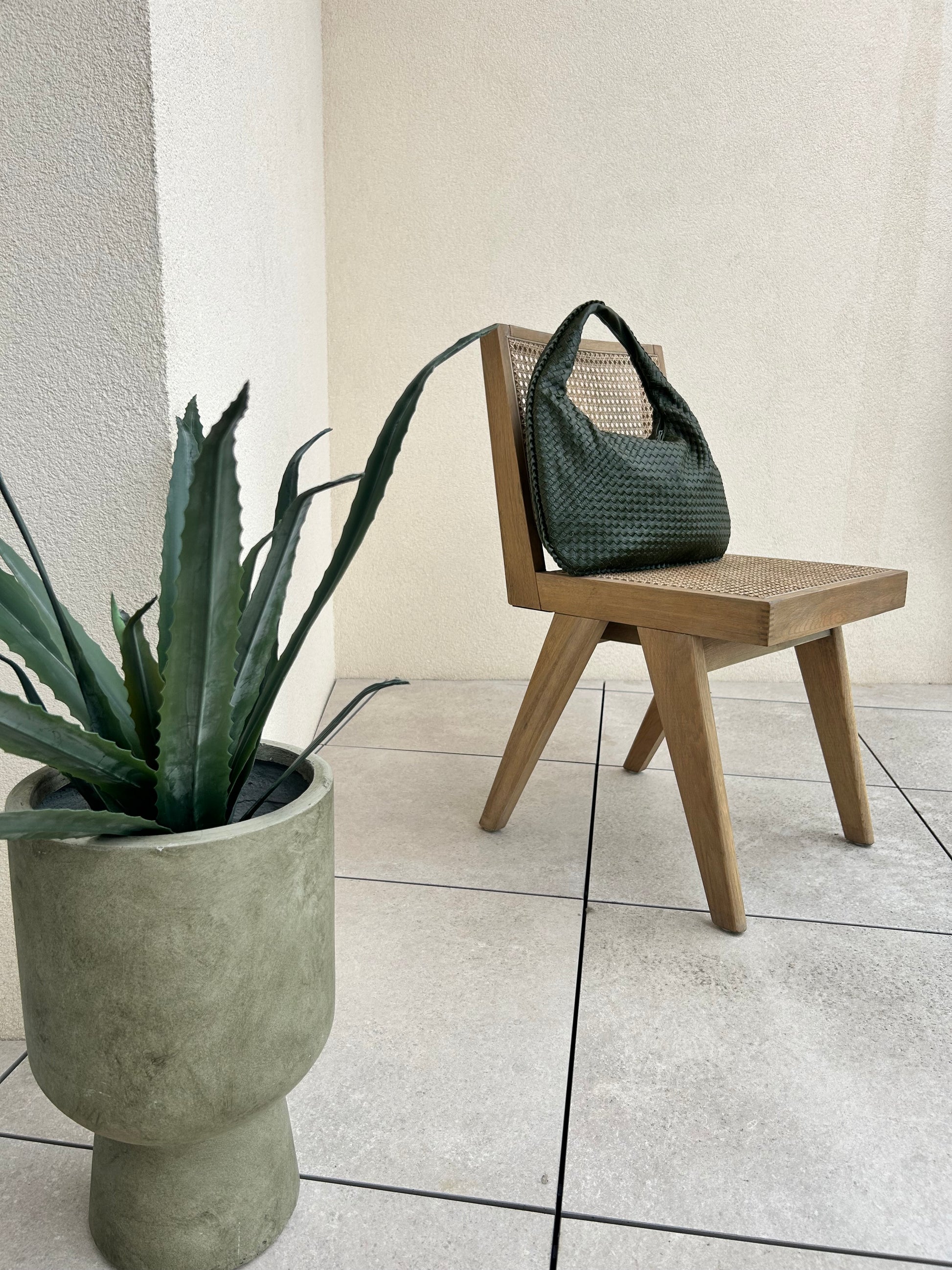 Soft strap woven shoulder bag in muted green tone