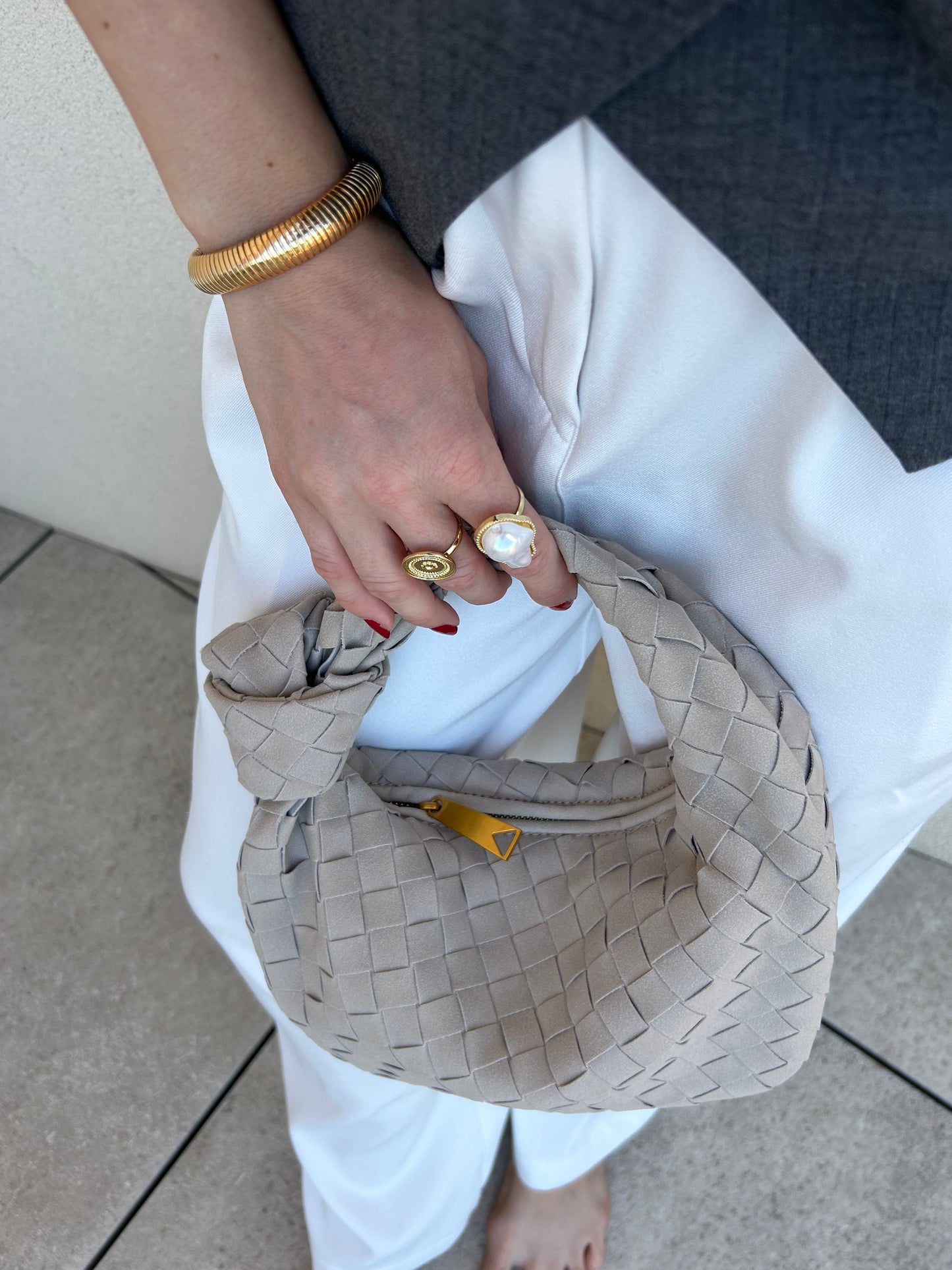 Soft vegan suede handbag detail in taupe colour