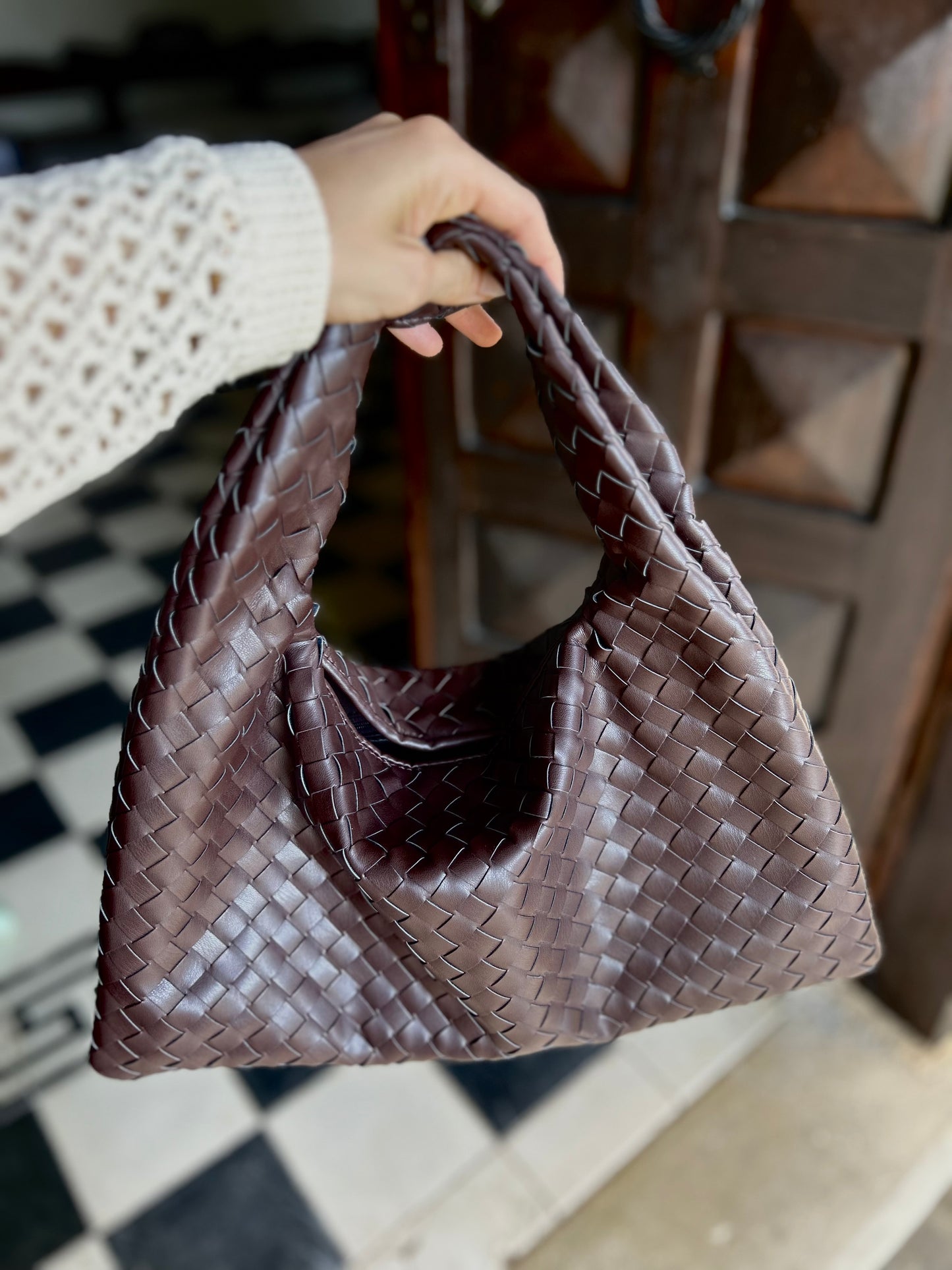 Women's chocolate brown woven everyday tote featuring a lightweight silhouette and elegant shoulder straps.