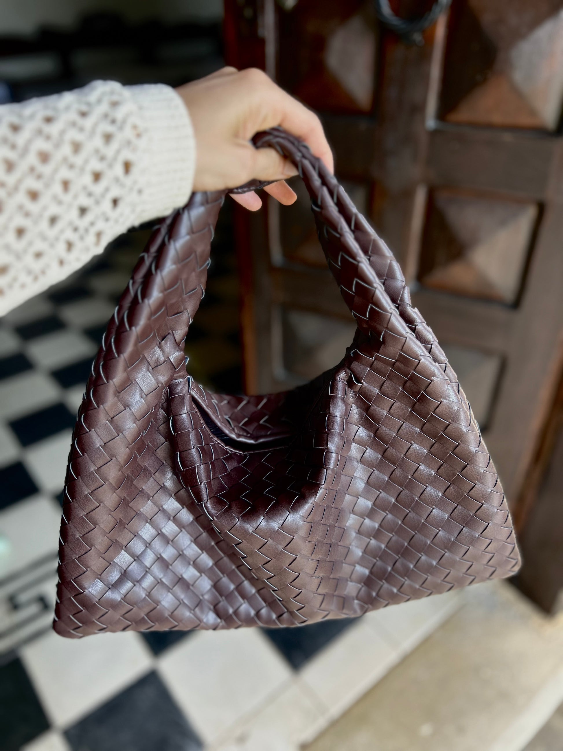 Women's chocolate brown woven everyday tote featuring a lightweight silhouette and elegant shoulder straps.