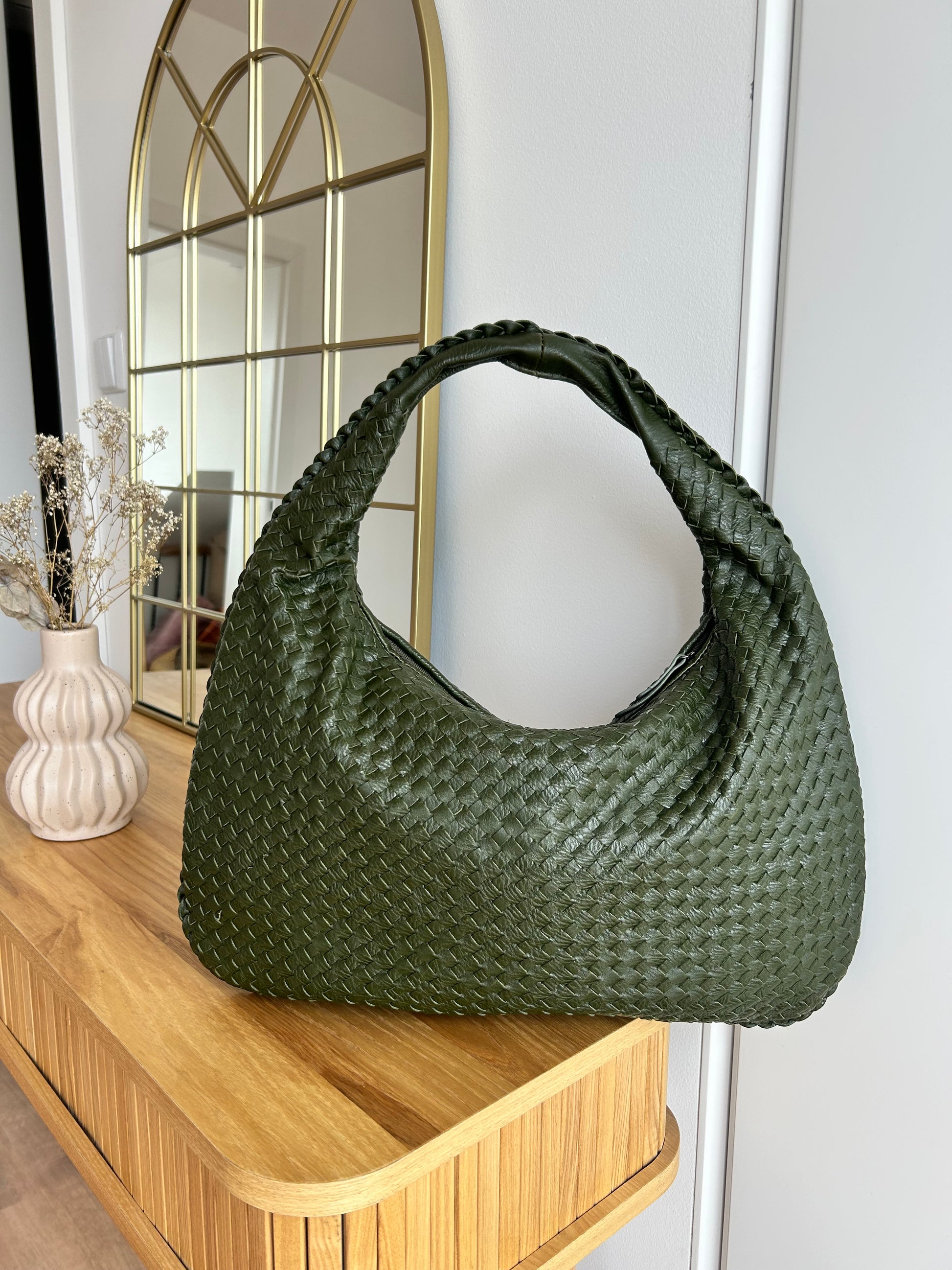 Woven military green handbag with slouchy silhouette