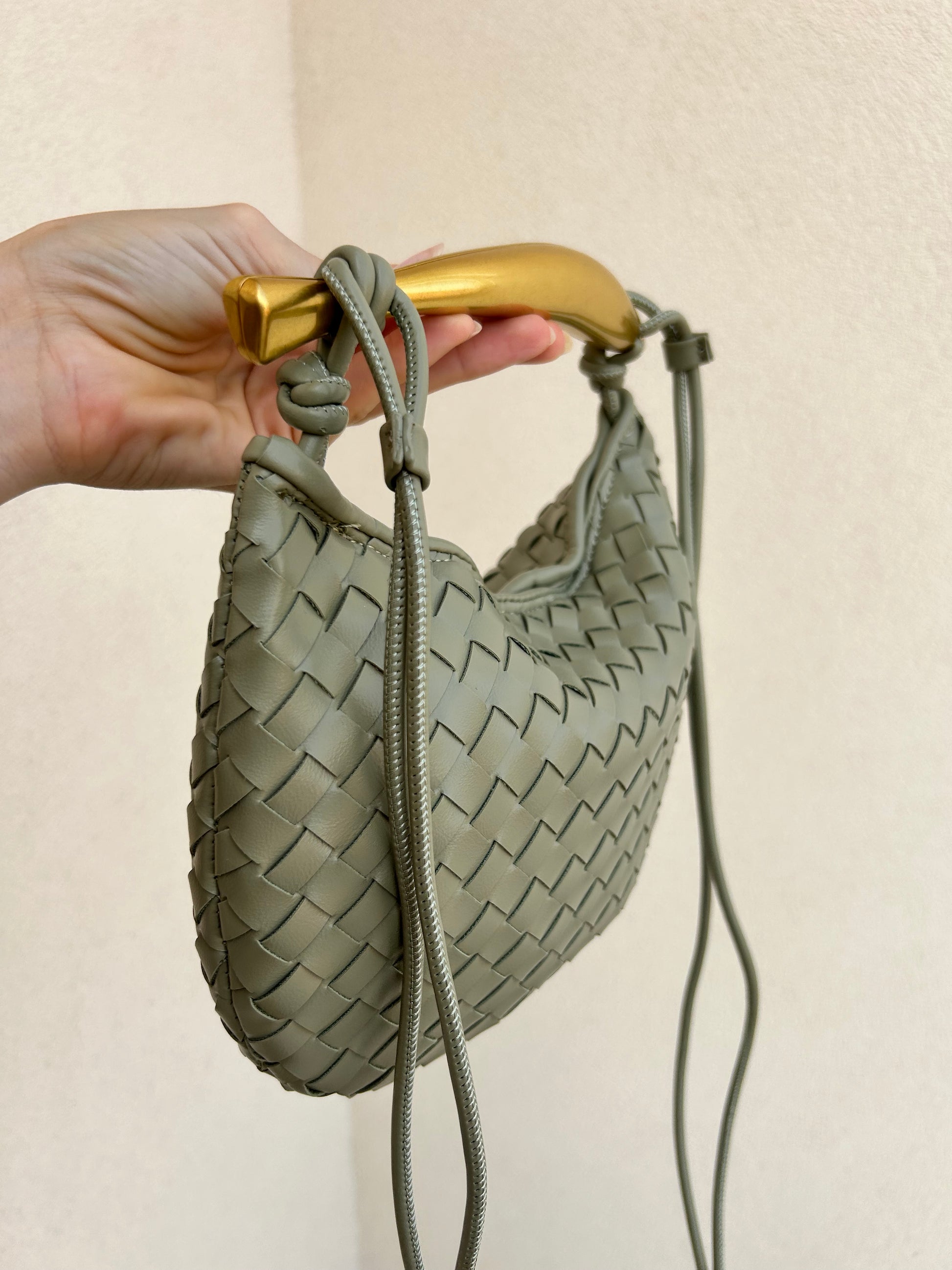 Introducing the Hobo Mini Pouch by Patty B, a luxurious top handle woven knot crossbody handbag designed for any special occasion. This braided clutch combines elegance with modern flair, making it a best seller and a must-have for fashion enthusiasts. Perfect as a gift for her, it's part of the autumn essentials and an ideal Christmas gift. 