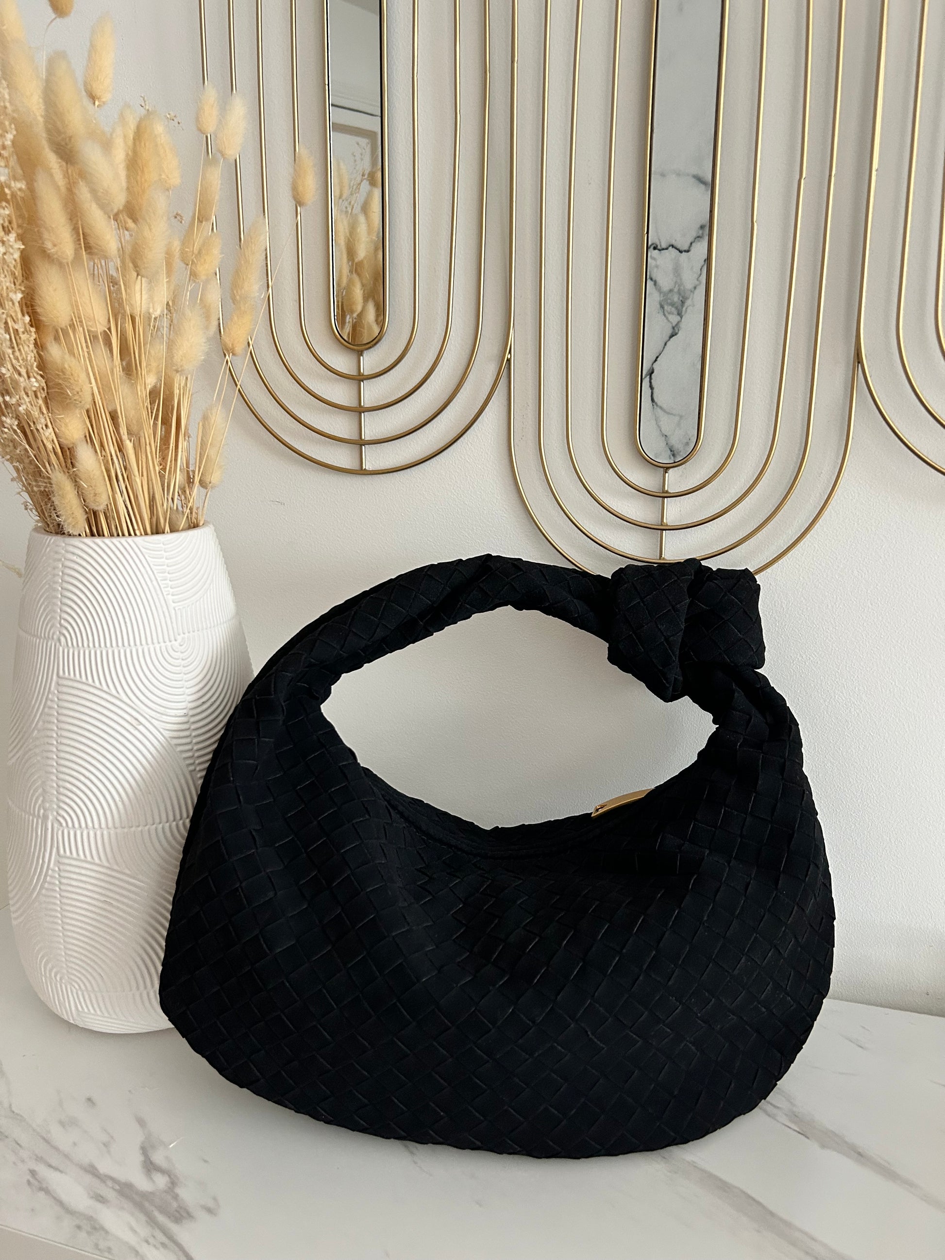 elegant black woven handbag evening look