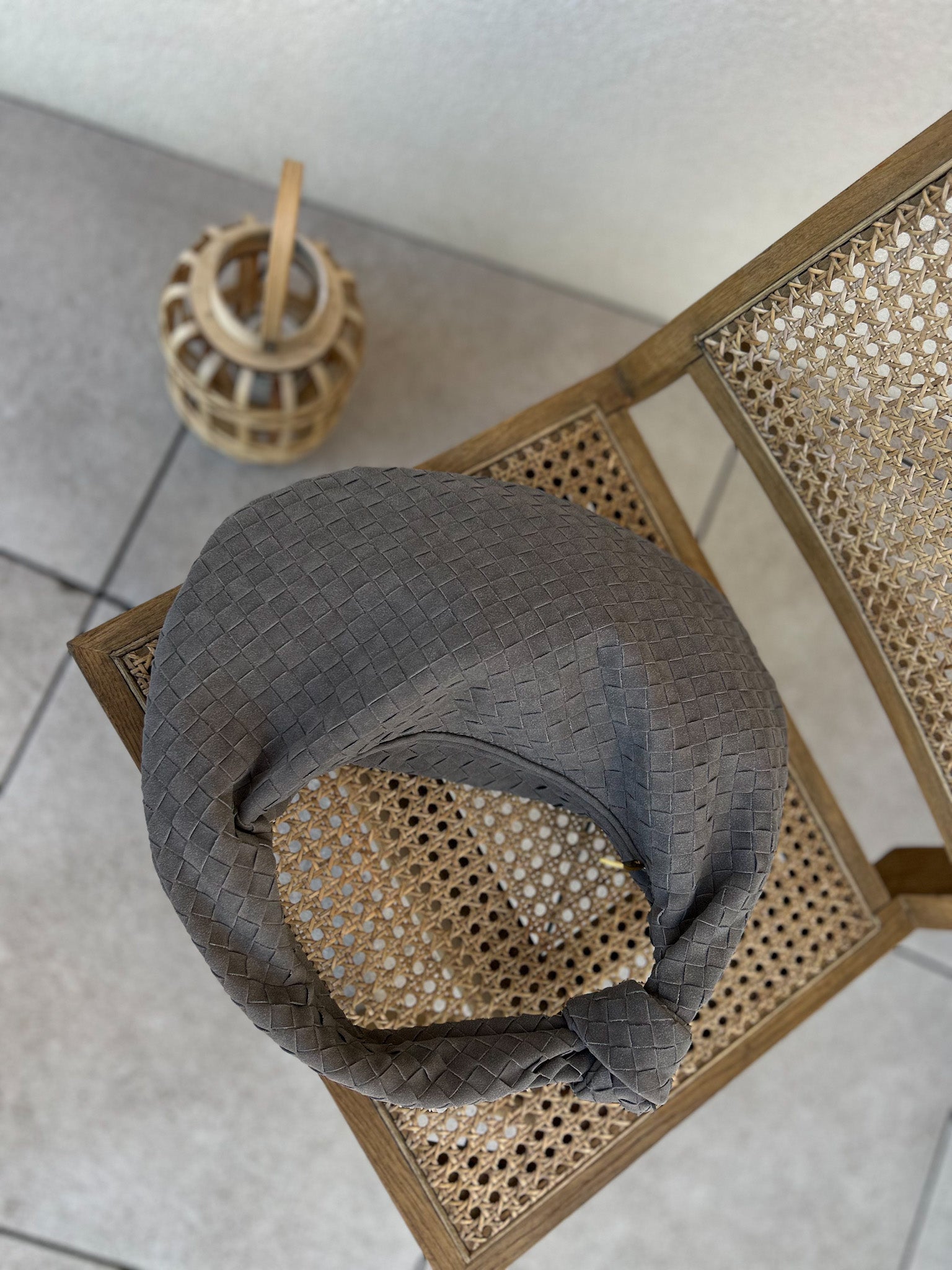 Crafted from high-quality vegan leather, this clutch features a large woven design that adds a touch of sophistication to any outfit. With its versatile style, this bag can be worn as a shoulder bag or a clutch. Designer dupe bag. Pattybofficial