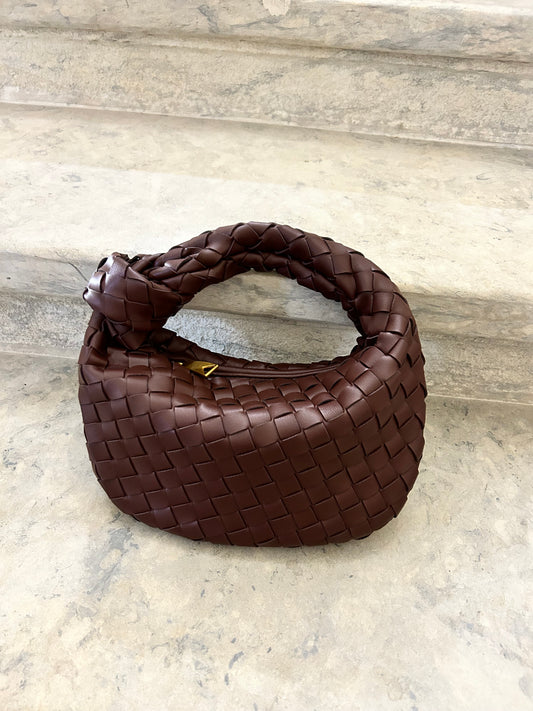 woven leather bag, mini knot bag, brown leather mini bag, luxury woven handbag, Italian leather handbag, sculptural leather bag, timeless statement bag, elevated neutral handbag, designer-inspired bag, compact leather purse
