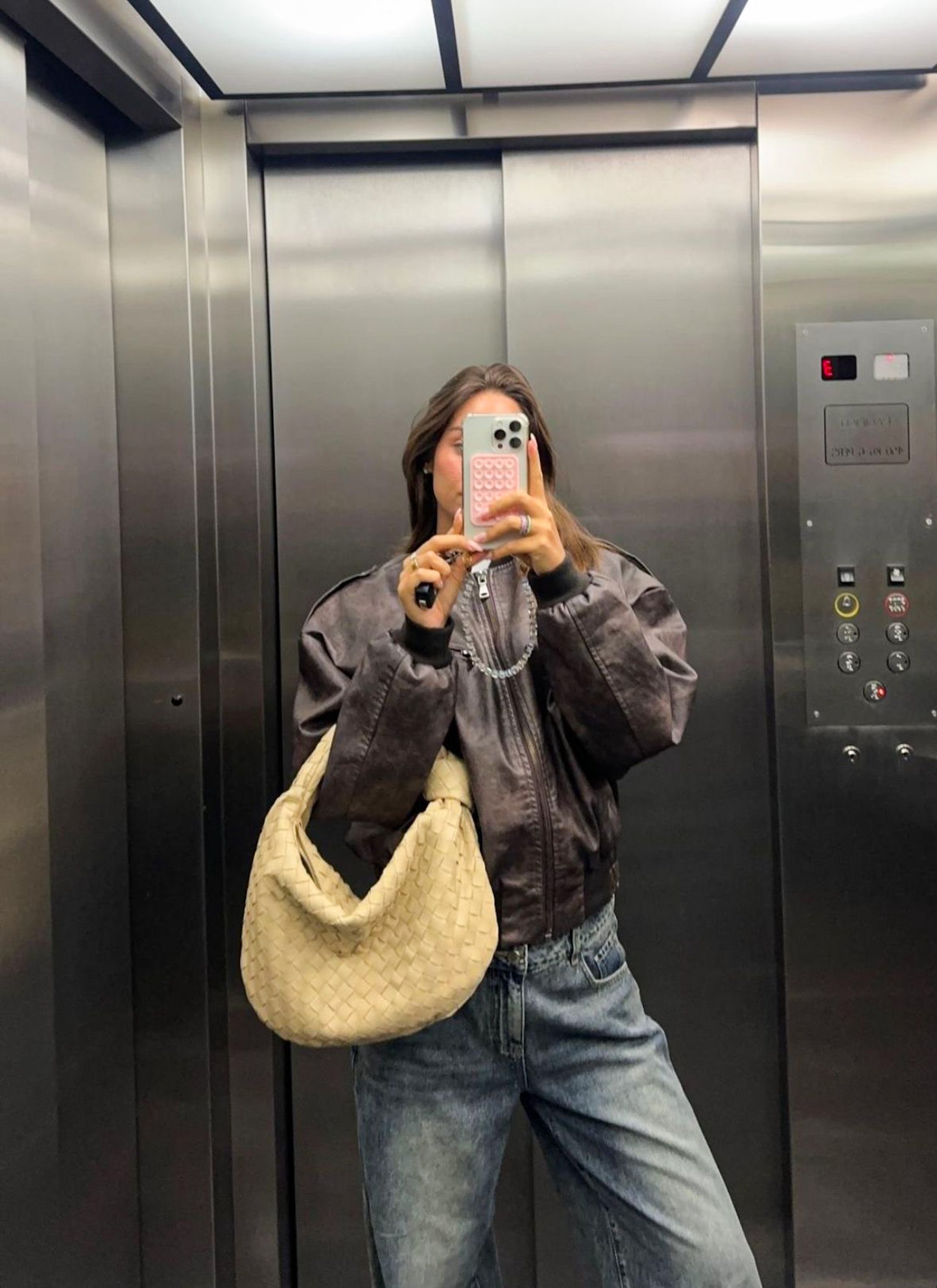 pastel yellow woven bag inspired by designer