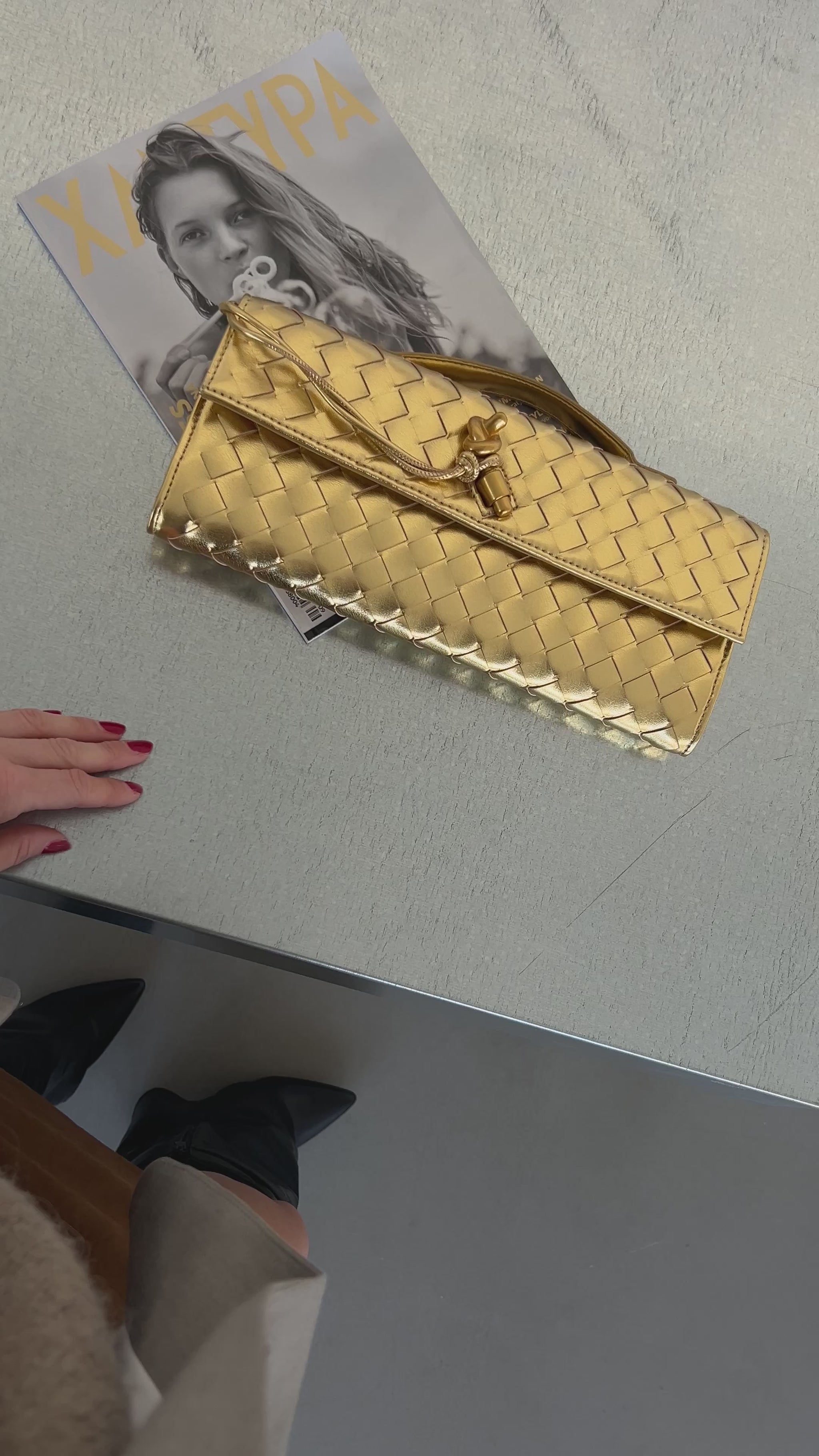 Elevate your style with our Braided Top Handle Crossbody Clutch, featuring a sleek woven design and a luxe gold pin accent. This chic handbag for women is the perfect blend of elegance and practicality, offering both a sophisticated top handle and an adjustable strap for versatile wear. Whether you're attending a special event or running errands, this best seller is designed to complement any outfit. Ideal as a statement piece or a thoughtful gift for her, this purse brings timeless fashion to your everyday