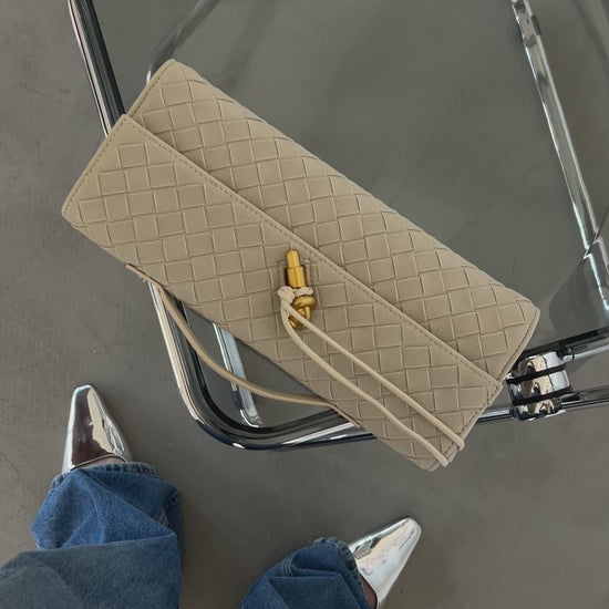 Close-up of soft vegan suede clutch showing clean minimalist design