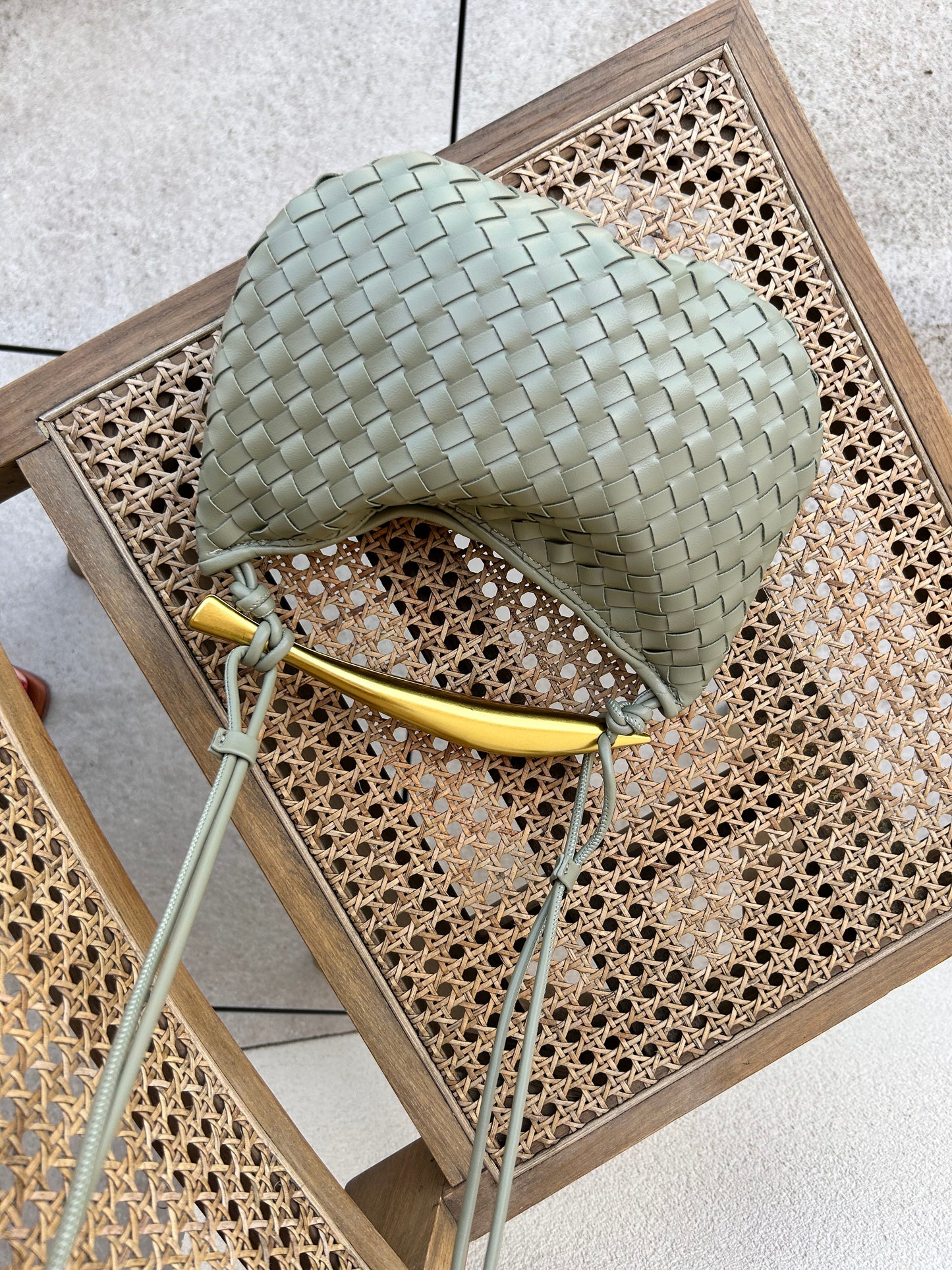 cruelty free and sustainable handbag in sage green colour with Top Handle, elegant Clutch for Everyday carry hobo crossbody bag from vegan leather is ideal as a Birthday Gift for Her inspired by famous designer pattybofficial knoten tasche