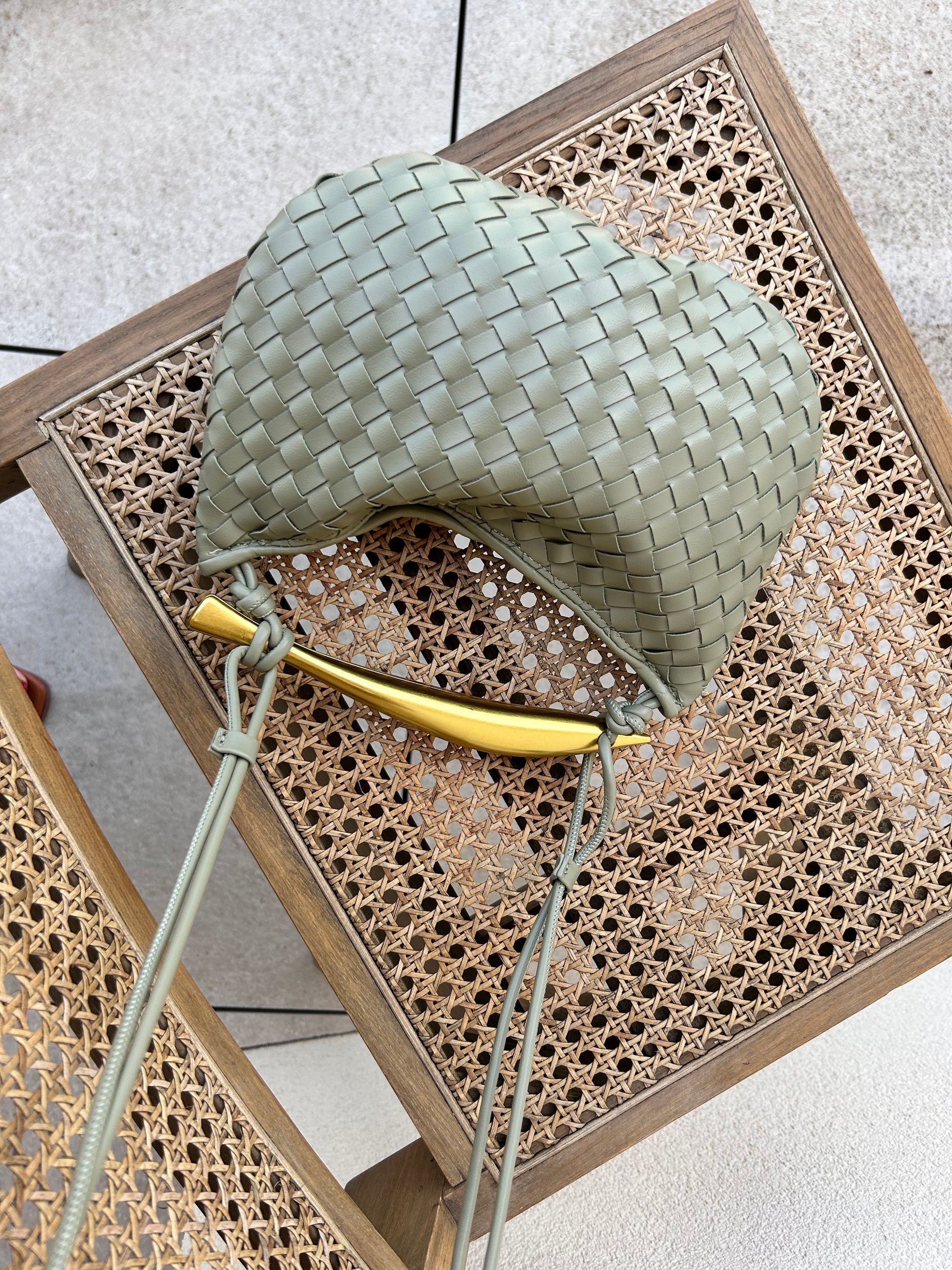 cruelty free and sustainable handbag in sage green colour with Top Handle, elegant Clutch for Everyday carry hobo crossbody bag from vegan leather is ideal as a Birthday Gift for Her inspired by famous designer pattybofficial knoten tasche