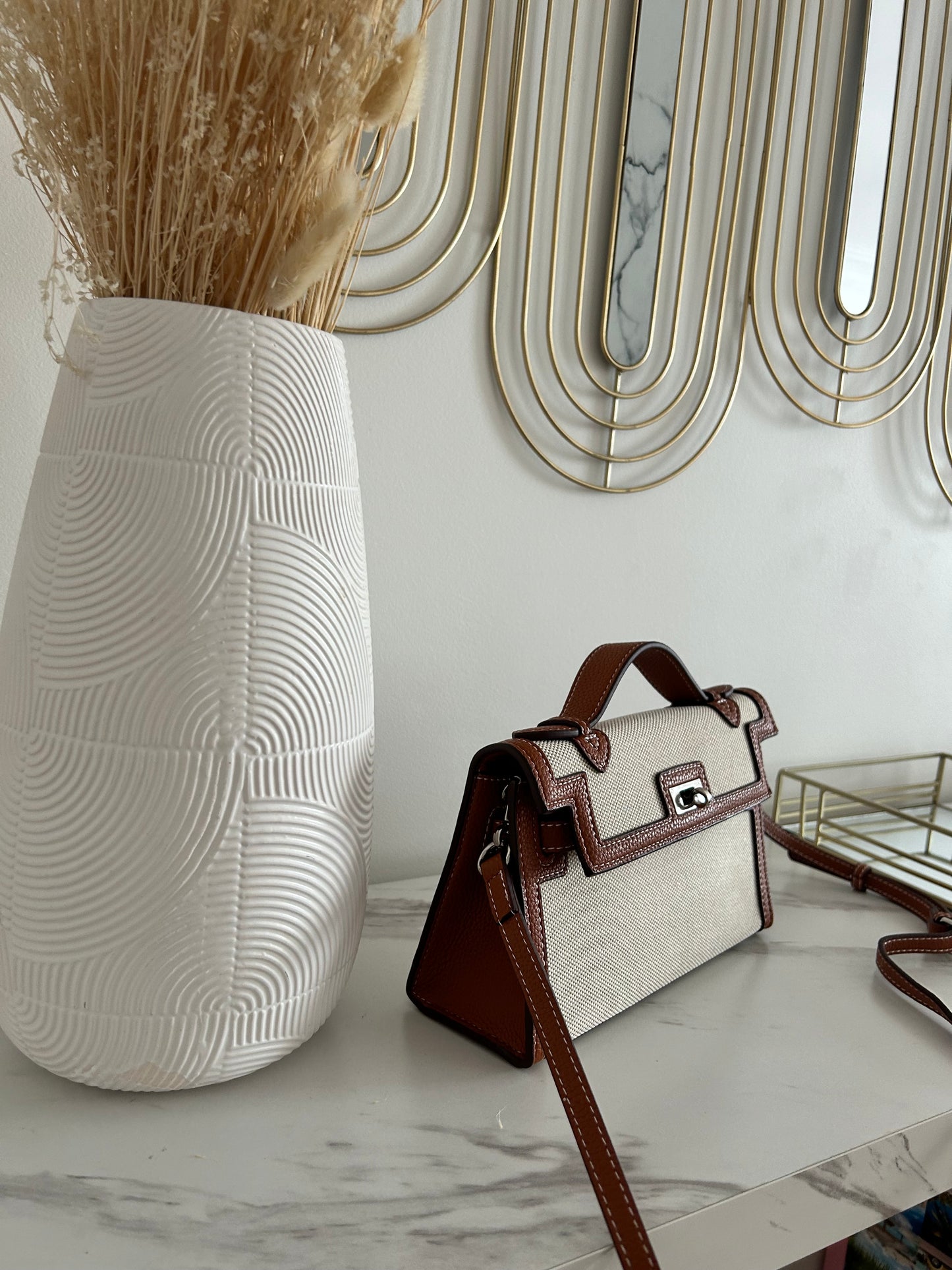 luxury canvas handbag, designer-inspired top handle bag, monochrome purse, structured women's handbag, boss babe accessories, elegant fashion bag, statement handbag for women, classy black and white purse, stylish canvas tote alternative, modern minimalist bag
