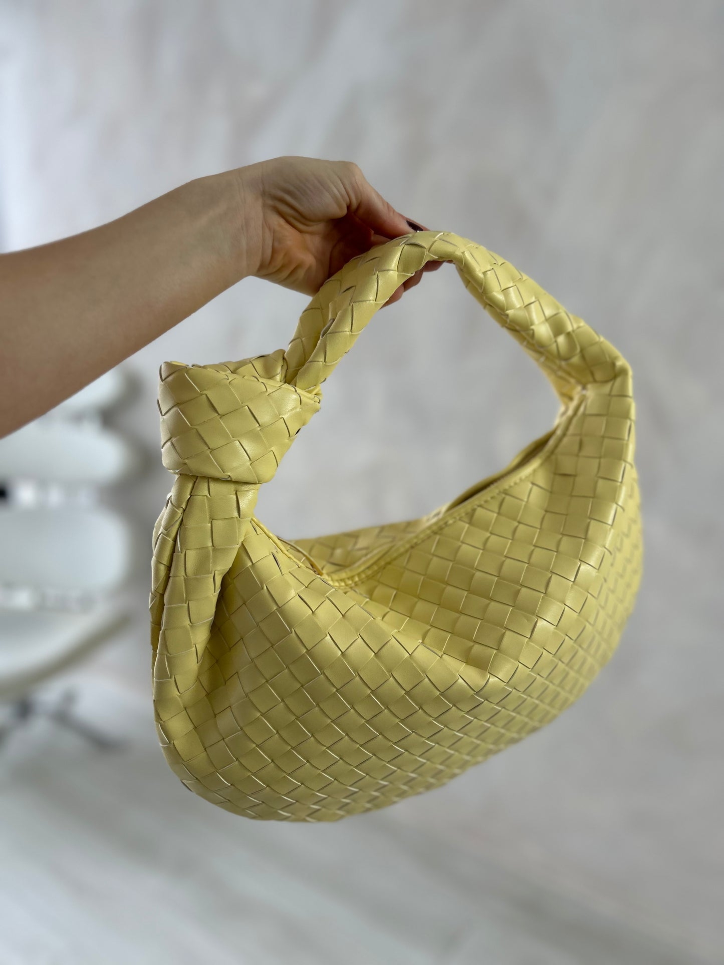 pastel yellow Woven Knot Shoulder Bag for Women in medium size. Designer Dupe Bag can be worn as clutch or on shoulder. slouchy look Vegan Leather woven knot bag   is sustainable fashion accessory for women and teenage girls. designer inspired bag